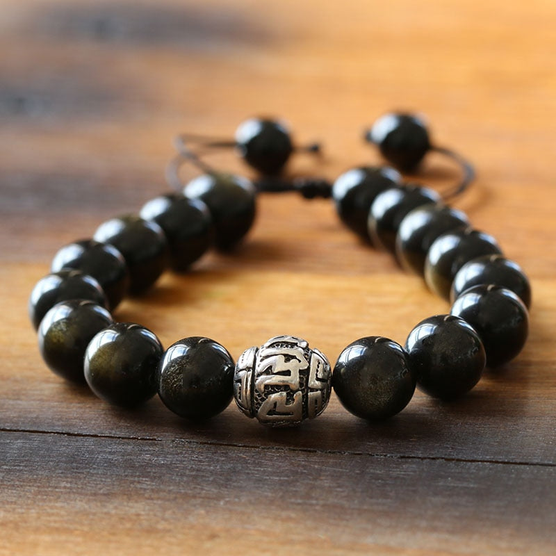 Golden Obsidian Beads and Tibetan Silver Mantra Charm