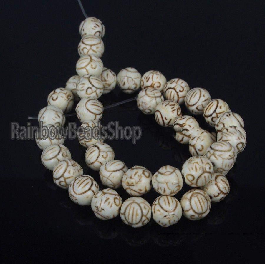 White Howlite Carved Ball Beads, 12-10mm 16'' strand