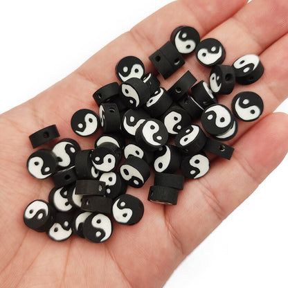 50pcs 10x4mm Perles rondes en argile polymère Tai Chi