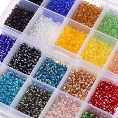 Coffret de perles toupies en verre à facettes