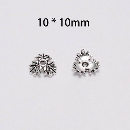 Capuchons de perles de fleurs creuses à 3 pétales de 10 mm, 50 pièces