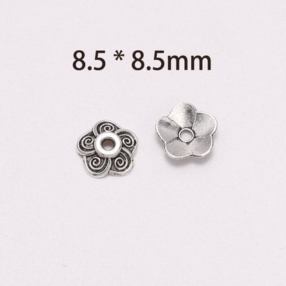 Capuchons de perles en fleur de prunier sculptées de 8,5 mm, 100 pièces