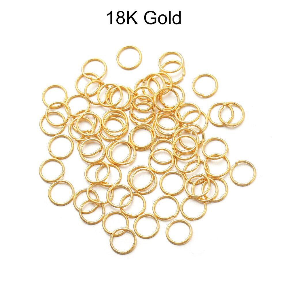 50 à 200 anneaux ouverts en cuivre et or 18 carats de 3 à 10 mm.