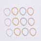 30 à 100 anneaux torsadés dorés de 8 à 20 mm.