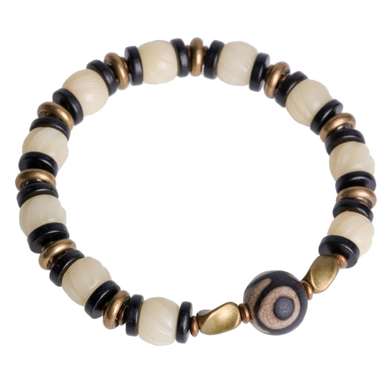 Carved Animal Bone Bead Bracelet with Tibetan Evil Eye Beads