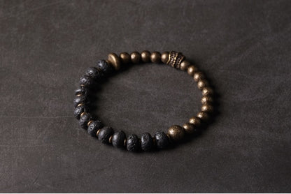 Bracelet de perles de lave noire et de cuivre oxydé