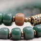 Green Bodhi Seed Bracelet with Brass Charm