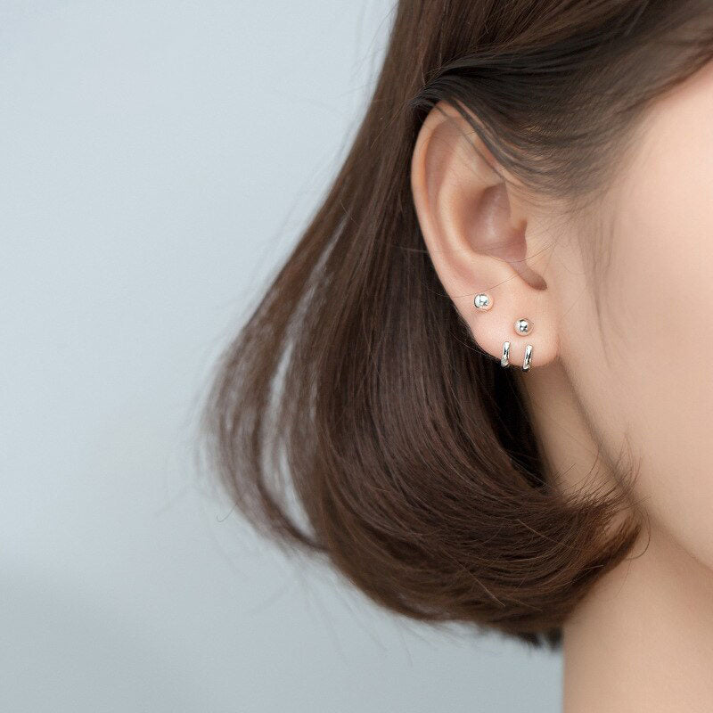 Boucles d'oreilles à tige avec perles punk au design abstrait