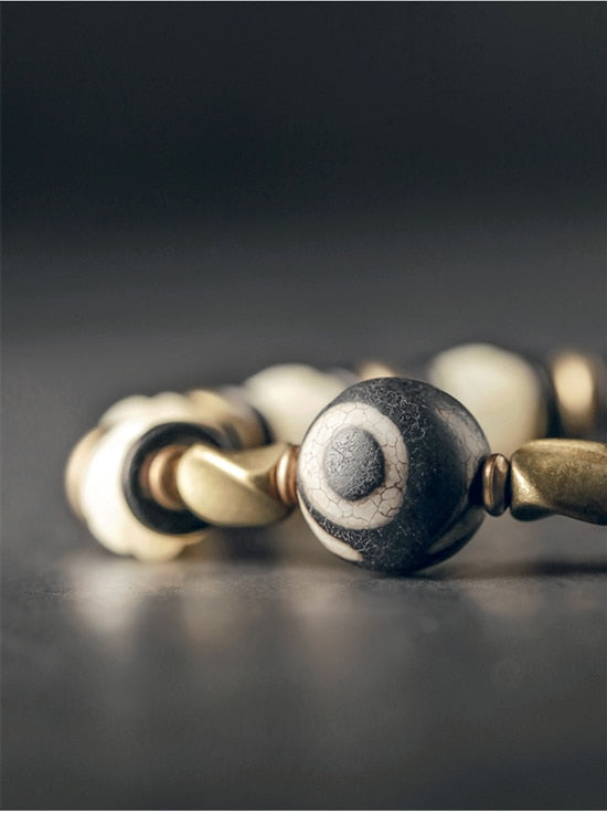 Carved Animal Bone Bead Bracelet with Tibetan Evil Eye Beads