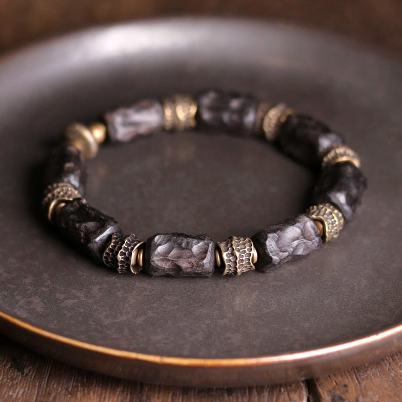 Bracelet made of Concave Convex Ebony Wood Bead and Hammered Copper