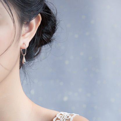 Boucles d'oreilles pendantes simples en forme de gouttes d'eau