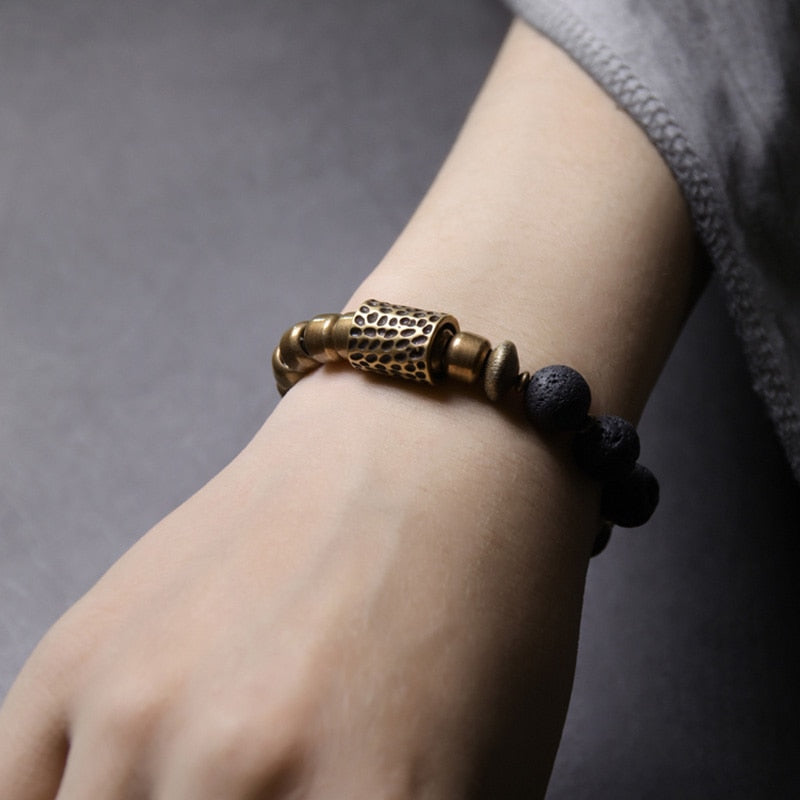 copper-charm-and-rock-lava-stone-bracelet.jpg