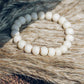 Bracelets de perles d’os de yak, charme en cuivre martelé