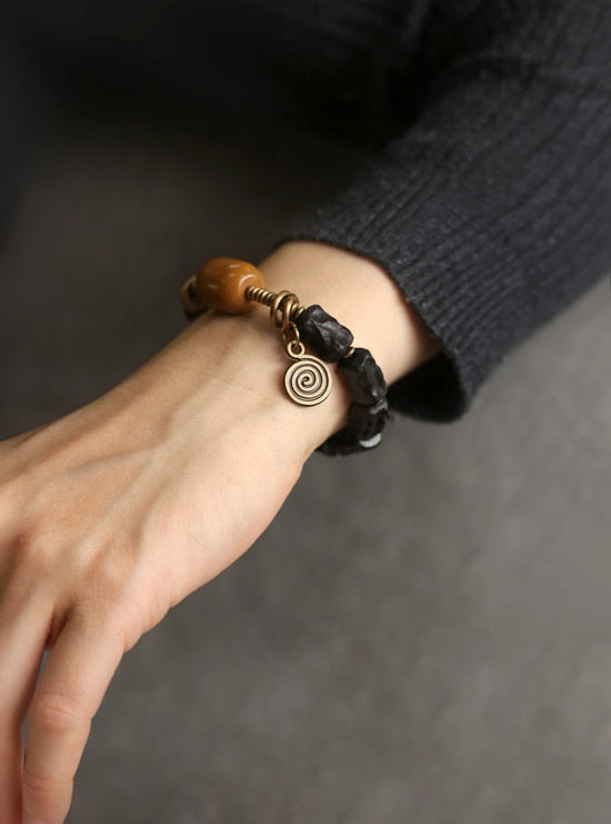 carved-ebony-wood-vintage-copper-bracelet.jpg