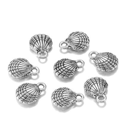 12 Stück 13 x 10 mm antike doppelseitige Muschel-Charms-Anhänger