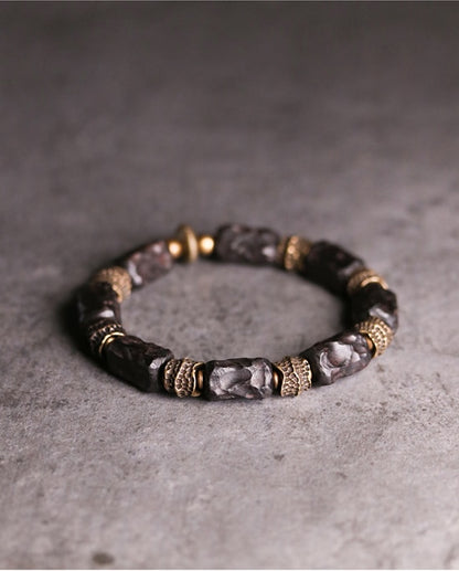 Bracelet made of Concave Convex Ebony Wood Bead and Hammered Copper