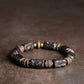 Bracelet made of Concave Convex Ebony Wood Bead and Hammered Copper