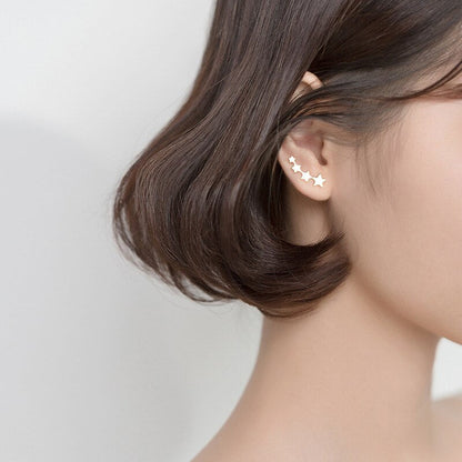 Boucle d'oreille brillante avec rangée d'étoiles empilables