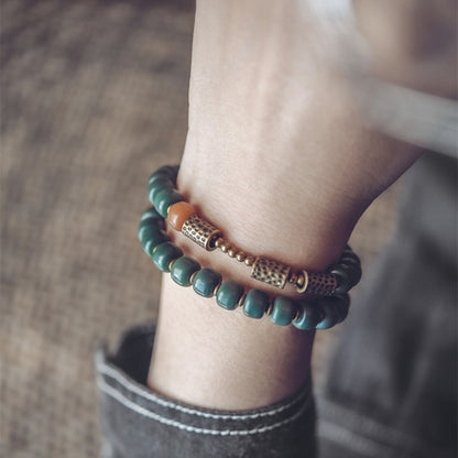 Green Bodhi Seed Bracelet with Brass Charm