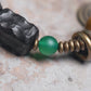 Bracelet de perles d’ébène sculpté, charme d’agate Gobi