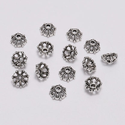 Capuchons de perles de fleurs creuses antiques à 7 pétales de 8 mm, 100 pièces