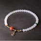 Bracelet de perles d'onyx gris blanc poli mat