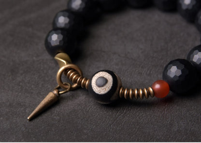 Faceted Onyx Beads Bracelet with Tibetan Anti Evil Bead