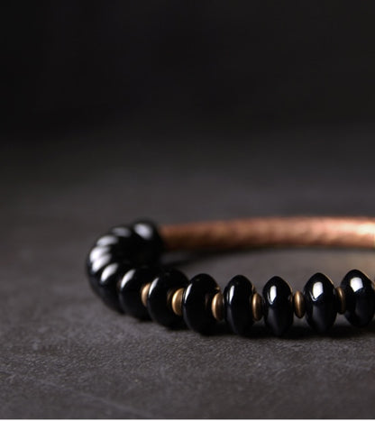 onyx-and-artificial-oxidized-copper-beads-bracelet.jpg