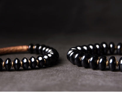 onyx-and-artificial-oxidized-copper-beads-bracelet.jpg