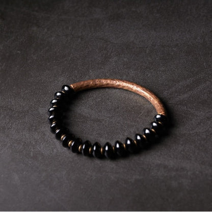 onyx-and-artificial-oxidized-copper-beads-bracelet.jpg