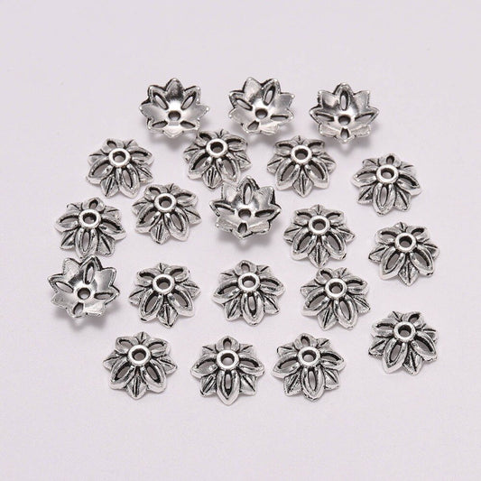 Capuchons de perles de fleurs creuses à 8 pétales de 10 mm, 20 pièces