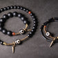 Facettiertes Onyx-Perlen-Armband mit tibetischer Anti-Böse-Perle