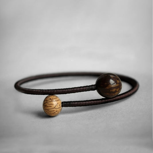 Bracelet jonc tibétain, corde tressée et perles en bois