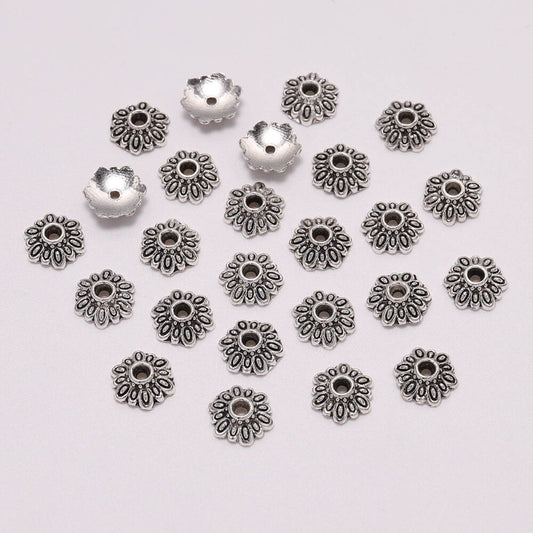 Capuchons de perles de fleurs rondes à 12 pétales de 8 mm, 50 pièces