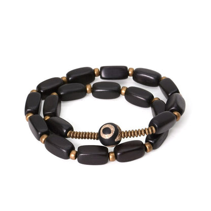 Bracelet multicouches en bois noir et perles de cuivre