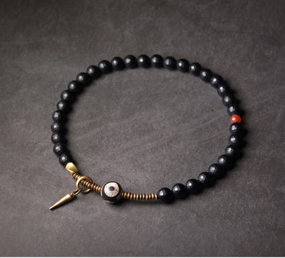 Faced Black Onyx Tibetan Bead Bracelet