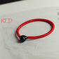 red-string-bracelet-with-black-obsidian-bead.jpg