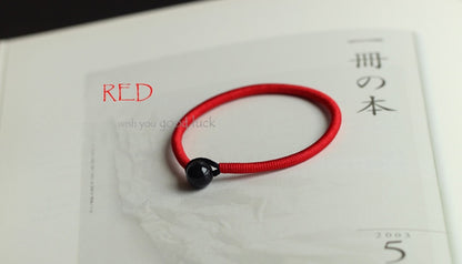 red-string-bracelet-with-black-obsidian-bead.jpg