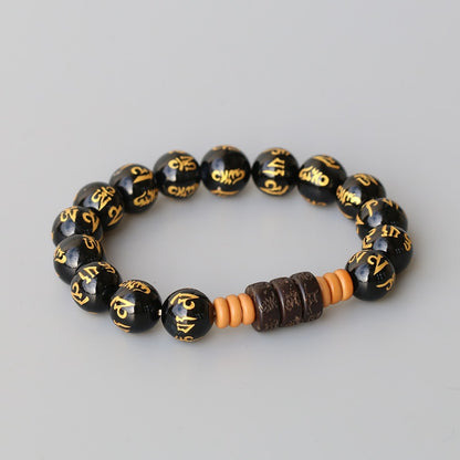 Bracelet extensible « Six vrais mots » plaqué or onyx sculpté