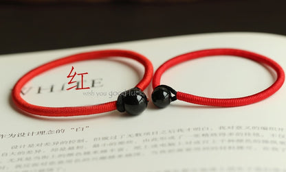 red-string-bracelet-with-black-obsidian-bead.jpg