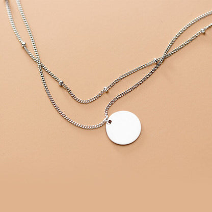 Collier minimaliste à pendentif petite boule à paillettes