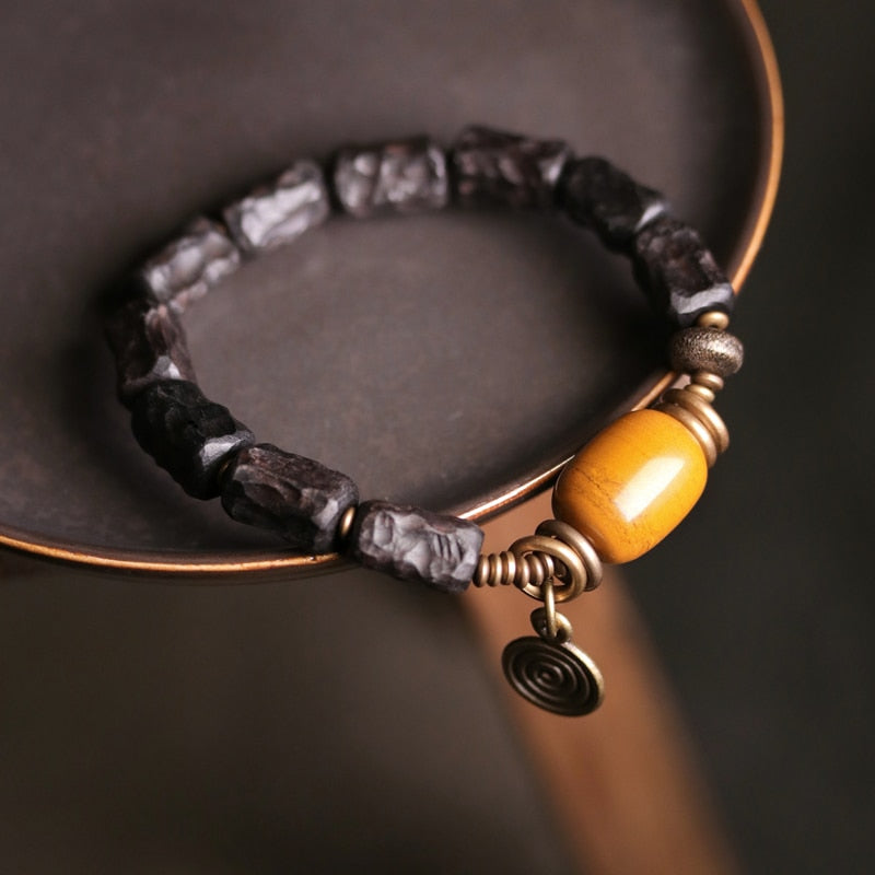 carved-ebony-wood-vintage-copper-bracelet.jpg
