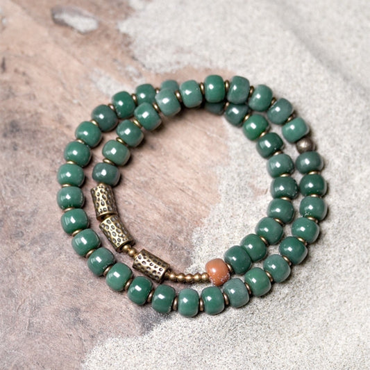 Bracelet de graines de Bodhi vertes avec charme en laiton