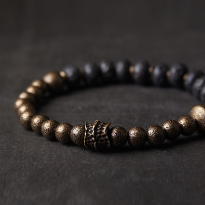 Bracelet de perles de lave noire et de cuivre oxydé