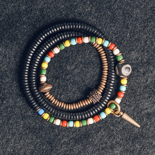 Bracelet en verre multicolore, bois d'ébène et perles tibétaines Dzi