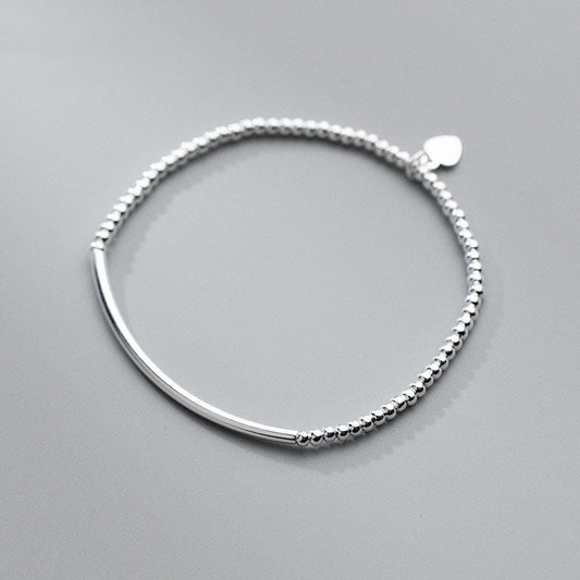 Bracelet réglable plaqué platine avec perles en forme de cœur