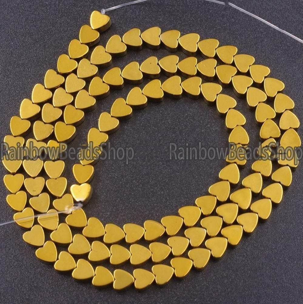 gold-flat-heart-hematite-gemstone-beads-4-10mm-15-5-strand-2.jpg?v=1658916669